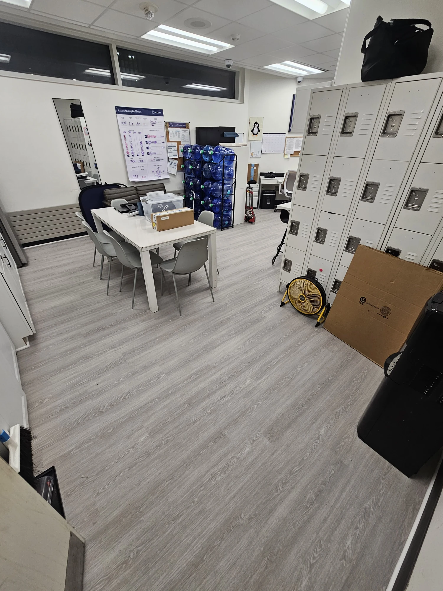 Gray plank flooring installed through an office room